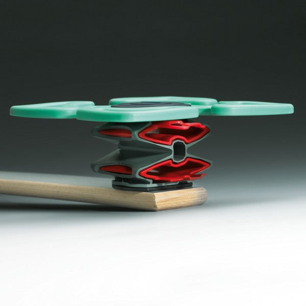 image of froli zona spring assembled on wood slat, showing 2 red lordosis inserts in spring part